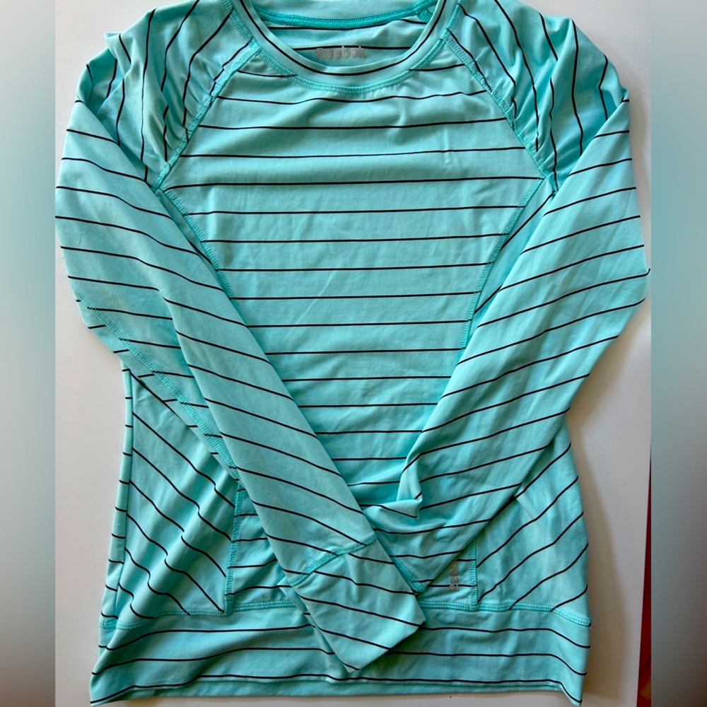 Women’s Reebok Light Blue Athletic Long Sleeve Pull-Over